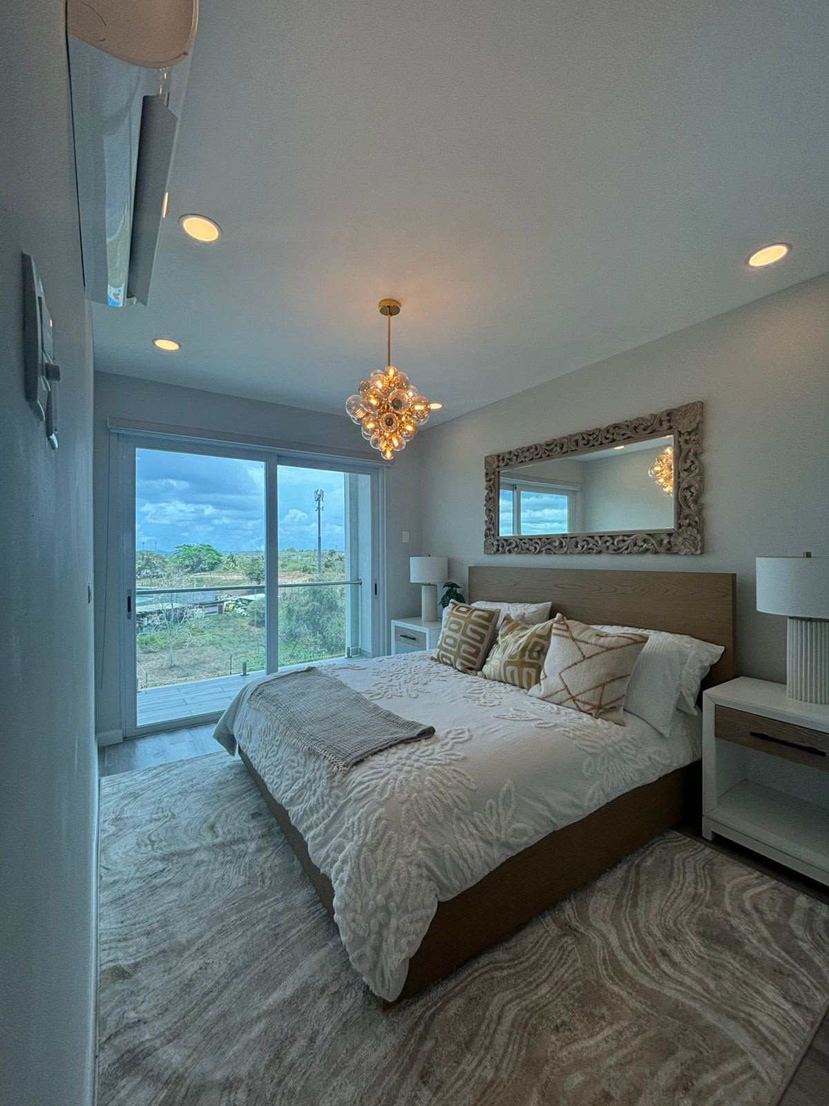 Master bedroom with balcony view